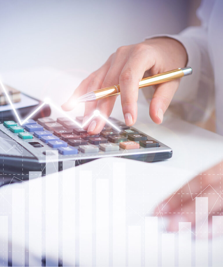 Accountant calculating profit with financial analysis graphs